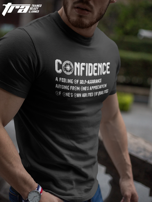 Confident man wearing a TRAINED READY & ARMED t-shirt. The tee shirt is 100% cotton. 